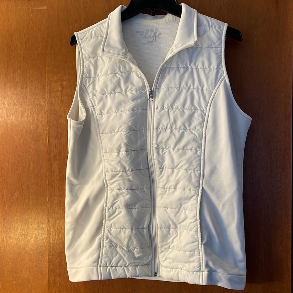 Lightweight, off white puffy vest, size large